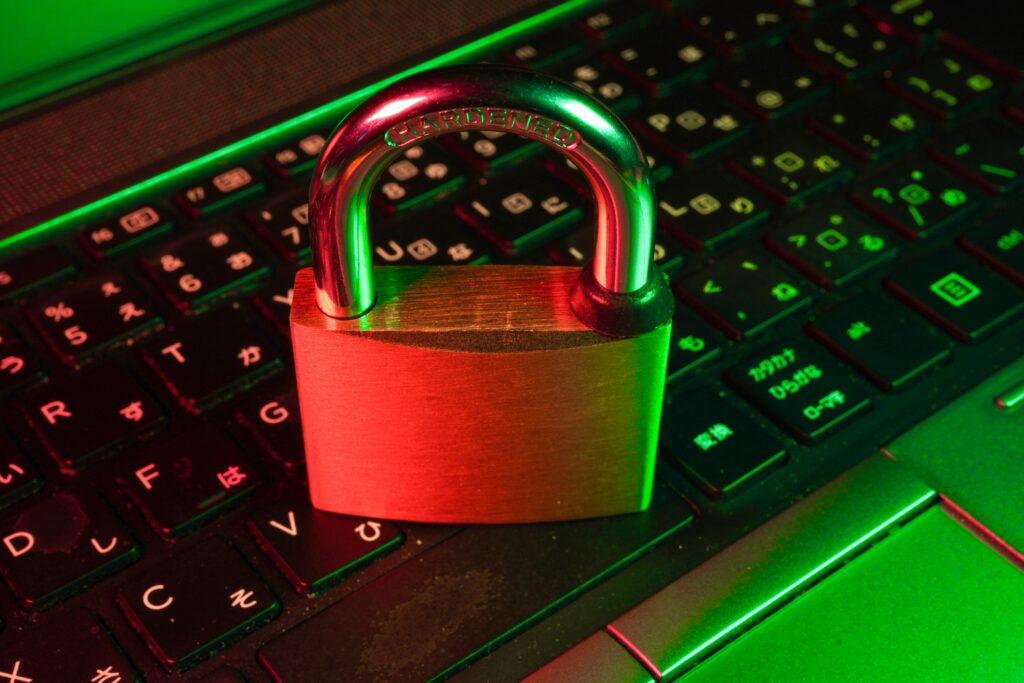 A padlock resting on a laptop keyboard